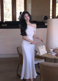 Nukty Elegant French Chic Satin Women's Dresses Solid Pleated Slim Wasit Inclined Shoulder Mermaid Dress 2025 New Summer Evening Party