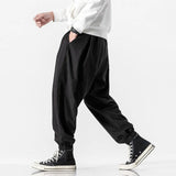 Nukty Men Harem Pants Solid Color Elastic Waist Joggers Pants Baggy Pants Drawstring Drop-crotch Pants Casual Hip Hop Trousers