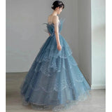 Nukty DRESS TO IMPRESS Blue Spaghetti Strap Evening Dress Luxury Tulle Applique Princess Cake Gown Sexy Illusion Backless Long Quinceanera Dresses