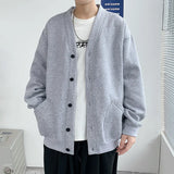 Nukty New Solid Fashion Cardigan Men's Knit Winter Coats Business Casual Jackets Male Tops Man Coat Size M-5Xl Knitwear 2 Colors