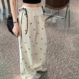 Nukty Fashion Lace Patchwork Women Casual Pants Summer Loose Preppy Bow Print Jogging Pants High Waist All Match Straight Trousers