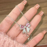 Nukty Korea New Design Bowknot Pink Zircon Cross Pendant Necklaces Fashion Temperament Clavicle Chain for Women Trendy Party Jewelry