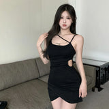 Nukty 2024 Fashionable European and American Solid Color Hollow Waist Fold Irregular Slim Fit Sexy Wrap Hip Hanging Strap Dress