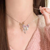 Nukty Korea New Design Bowknot Pink Zircon Cross Pendant Necklaces Fashion Temperament Clavicle Chain for Women Trendy Party Jewelry