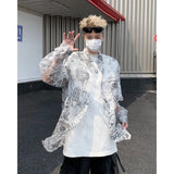 Nukty Fashion Hollow out Printed Shirt Men Long Sleeve Transparent Casual Loose Tops Streetwear Lapel Tops Sun-proof Clothing