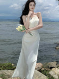 Nukty Spring Elegant Beige Long Dress Women New Fashion Spaghetti Strap Dresses Female Evening Party Prom Robe Summer Satin Gown Mujer