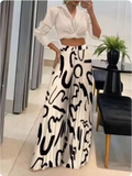 Nukty Fashion Colorful Printed Elastic Pants Women Elegant Wide Leg Pants Women Casual Loose Trousers