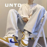 Nukty New Men Casual Long Jeans Fashion Classic Male Loose Straight Wide Leg Denim Pants Solid Color Light Blue Grey Black 3XL