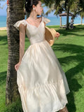 Nukty Women V Neck Backless Evening Party Dress Summer Beige Sweet Temper French Fairy Sundresss Fashion Clothing Vestido