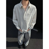 Nukty spring New Long sleeved Shirt Men Fashion Social Mens Dress Shirt Korean Loose Casual Striped Shirts Mens Formal Shirt