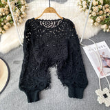 Nukty Bohimian Sweater Women O-neck Lantern Sleeve Tassel Female Causal Crochet Tops Ladies Knitted Hollow Out Sweaters Dropshipping