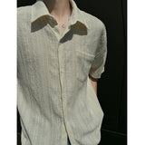 Nukty Rice White Hollow Out Shirts for Men Handsome Lapel Blouse Ice Silk Sexy Fashion Men Clothing Male Mesh Short Sleeve Shirts