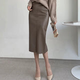 Nukty Elegant Fashion Faux Leather PU Skirts Women Clubwear Party Office Lady High Waist Midi Skirts Bodycon Wrap Hips Bottom Clothes