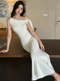 Nukty Summer Solid Mermaid Long Dresses for Women French Fashion Diagonal Collar Bodycon Party Dress Slim Vestidos Female Clothing New