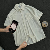 Nukty Rice White Hollow Out Shirts for Men Handsome Lapel Blouse Ice Silk Sexy Fashion Men Clothing Male Mesh Short Sleeve Shirts