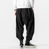 Nukty Men Harem Pants Solid Color Elastic Waist Joggers Pants Baggy Pants Drawstring Drop-crotch Pants Casual Hip Hop Trousers