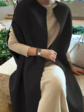 Nukty Simple Sleeveless Solid Color Round-Neck Cape Outerwear