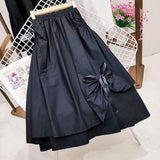 Nukty Spring and Summer New Slim Skirt Female Fake Pocket Design Irregular Large Swing Skirt Mid-length A-line Skirt
