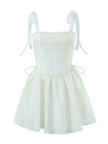 Nukty White Strap Dress 2024 Spring Summer New Sexy Holiday Fashion Slim Waist Hollow Tie Short Mini Dress For Women