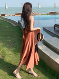 Nukty Summer New French Retro Satin Sexy Super Fairy White Suspender Dress Seaside Holiday Wind Open Back Beach Long Skirt Women